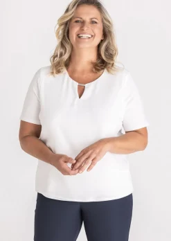 Blouse fluide avec élément décoratif au décolleté