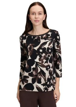 Blouse fluide dense et structurée