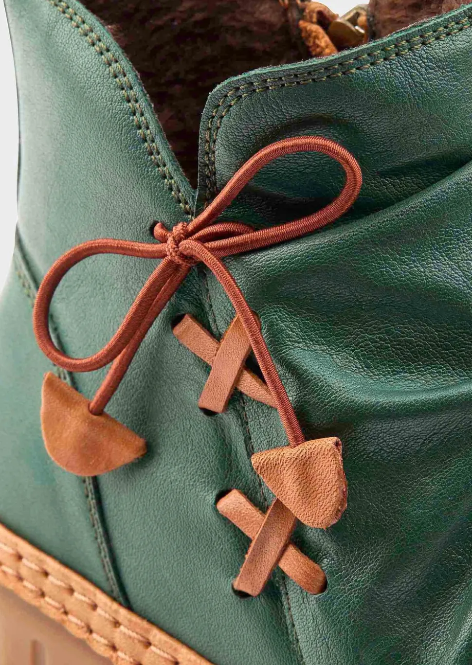 Bottines en cuir avec nœud décoratif