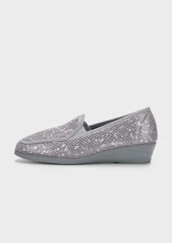 Chaussons avec semelle extérieure à surface structurée pour une meilleure accroche.