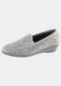 Chaussons avec semelle extérieure à surface structurée pour une meilleure accroche.