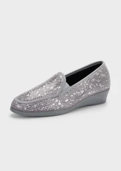Chaussons avec semelle extérieure à surface structurée pour une meilleure accroche.