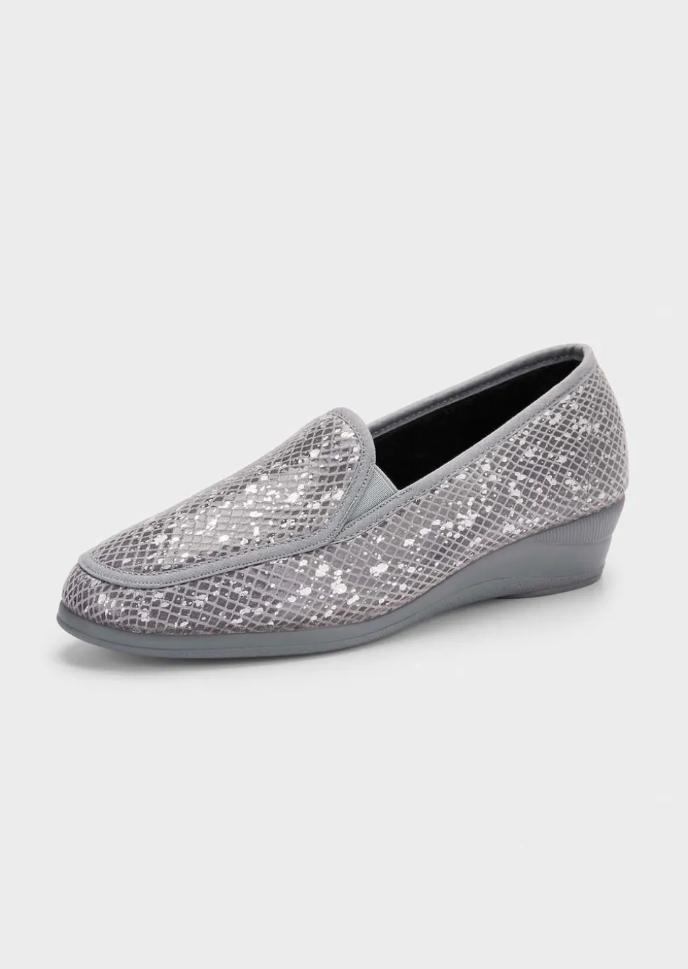 Chaussons avec semelle extérieure à surface structurée pour une meilleure accroche.