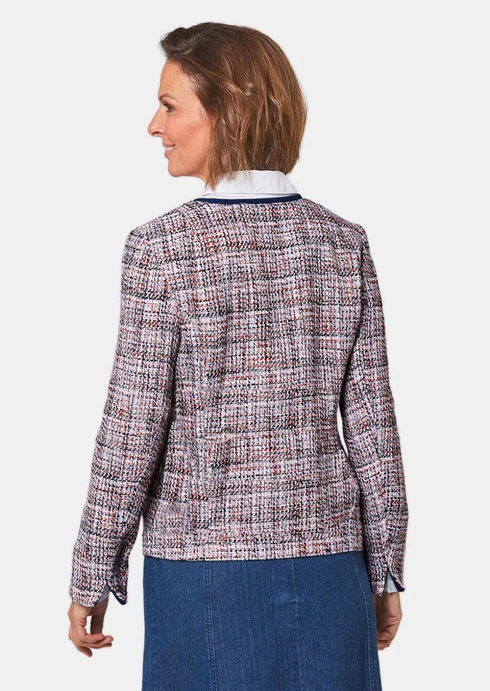 Elégant blazer en tissu bouclette et passepoil en jean
