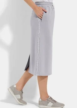 Jupe en sweat avec lien de serrage sous coulisse. En coton et élasthanne.