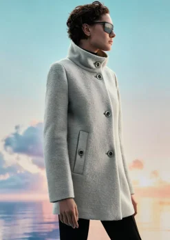 Manteau laineux élégant, avec col montant