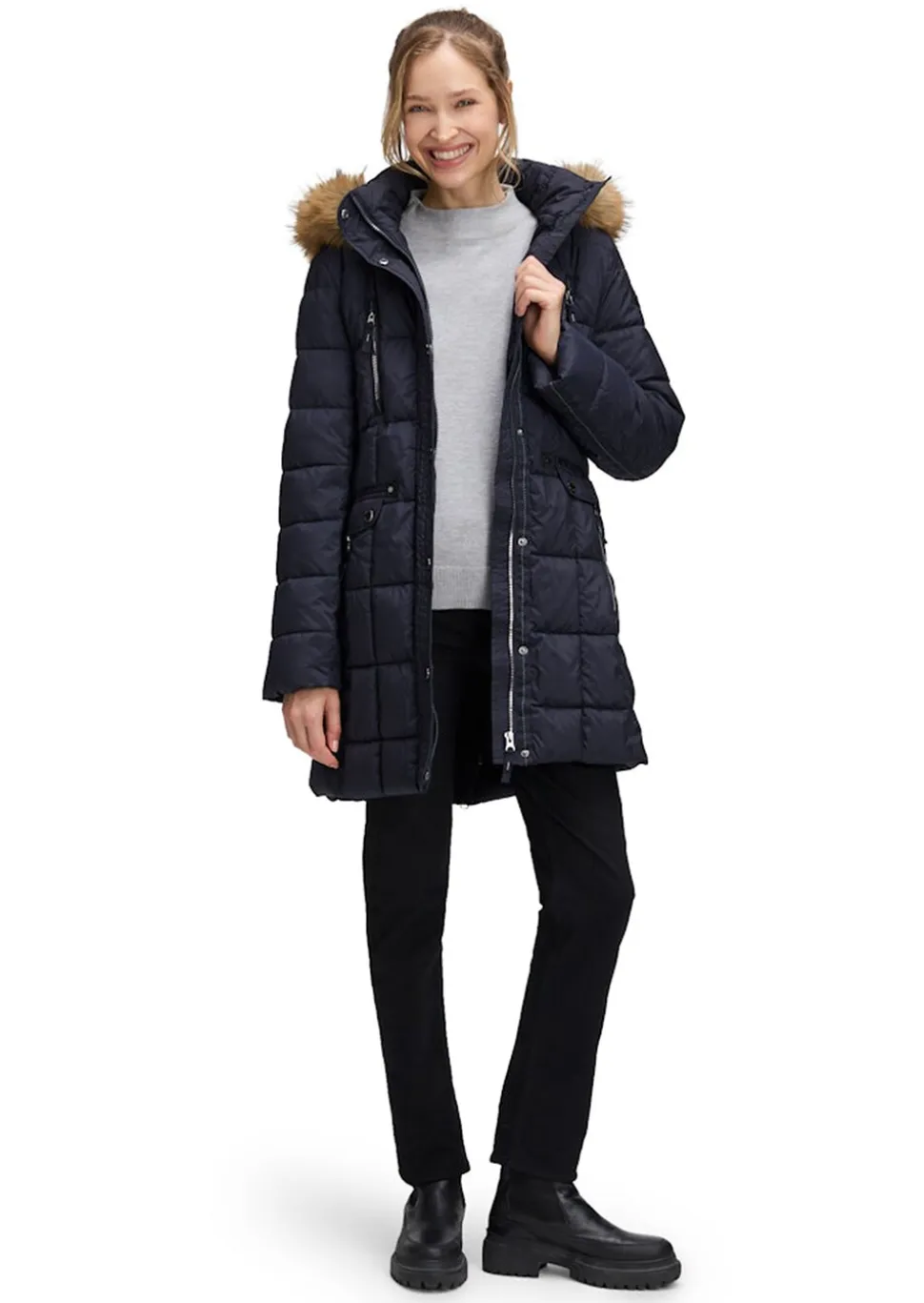 Manteau matelassé avec de nombreuses poches zippées
