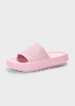 Mules de bain avec semelle extérieure à surface structurée pour une meilleure accroche.