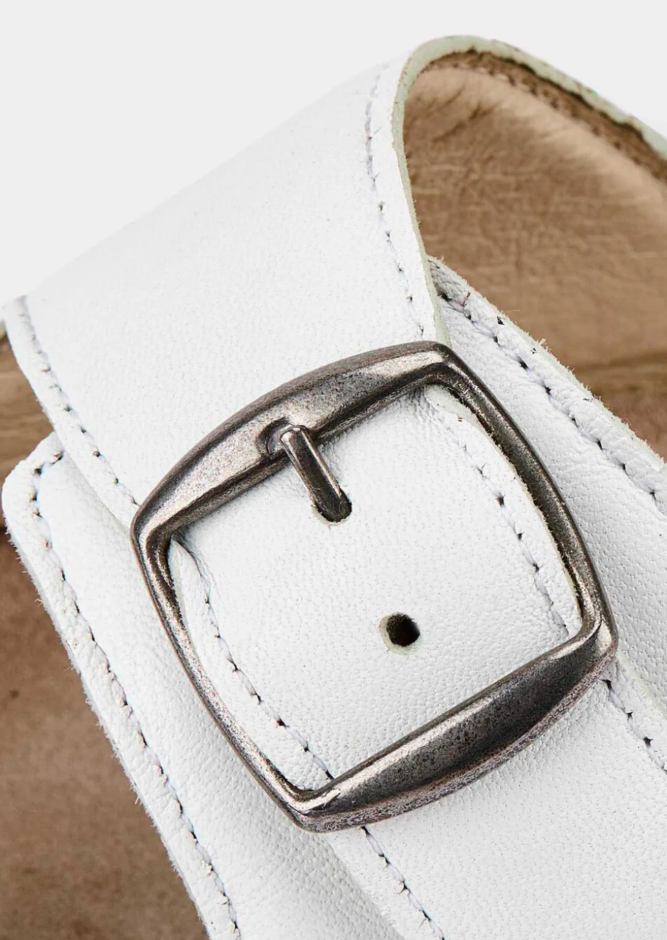 Mules en cuir avec boucles en métal
