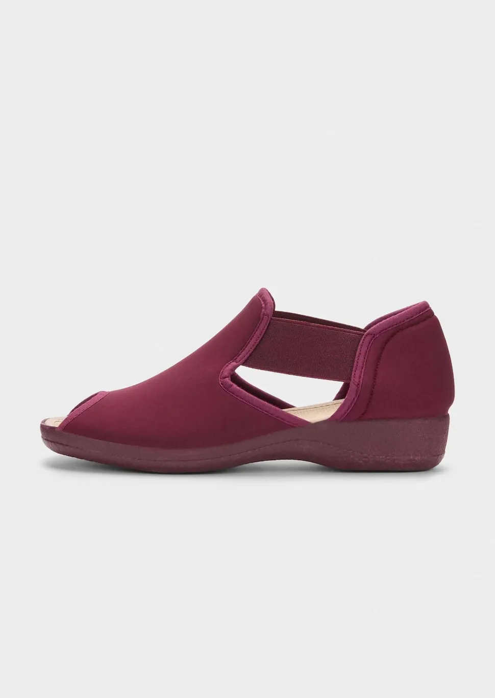 Pantoufles avec élastique et semelle extérieure à surface structurée pour une meilleure accroche.