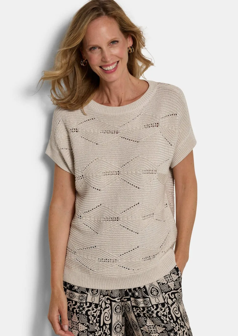 Pull ajouré, légèrement brillant