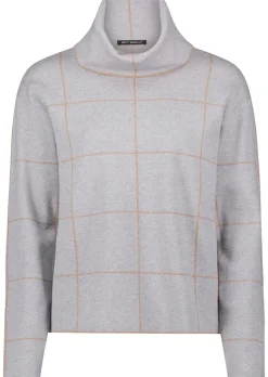Pull à col roulé avec motif à carreaux
