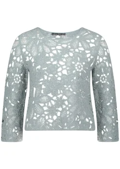 Pull crocheté avec motif floral