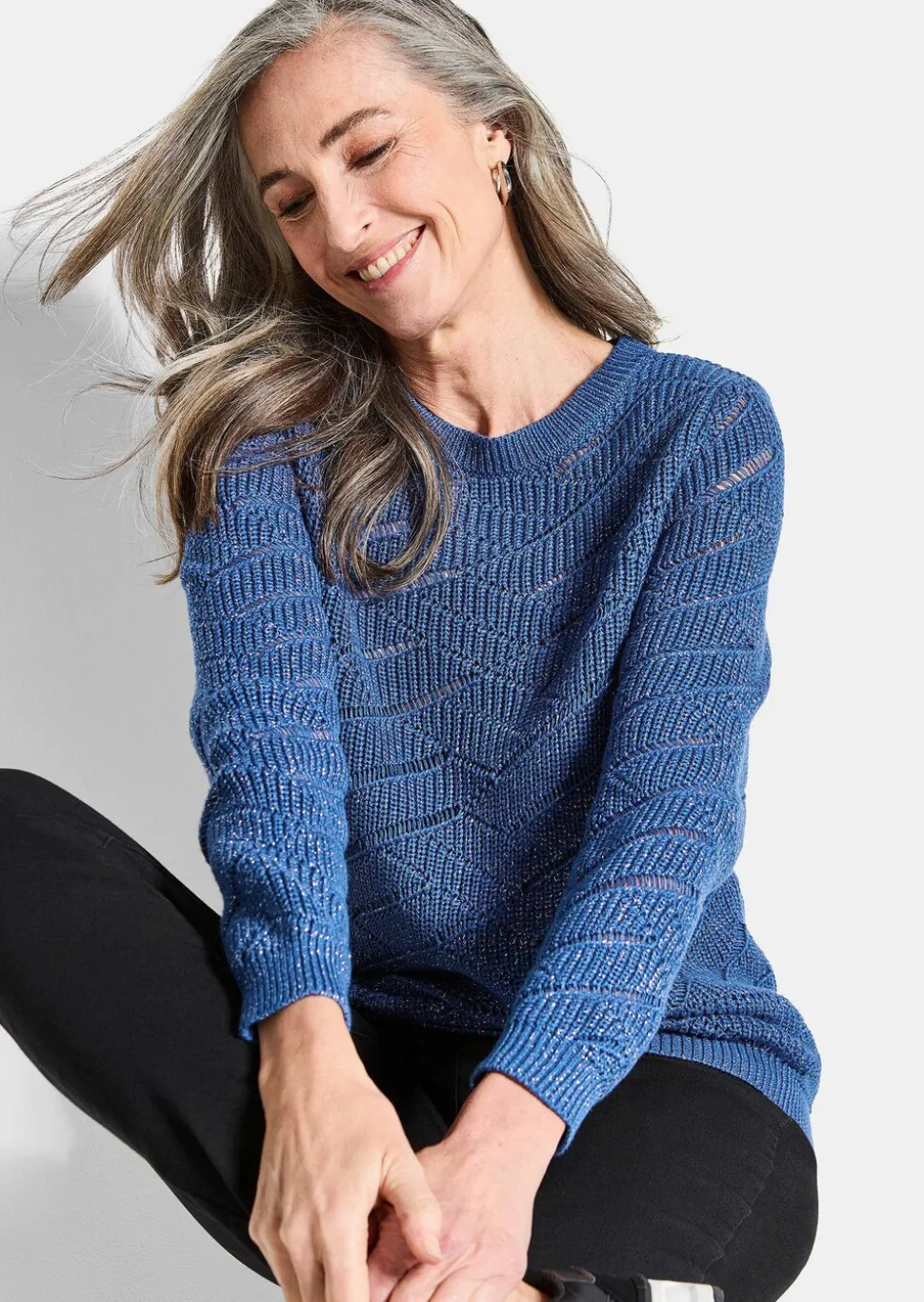 Pull en maille ajourée et tricot côtelé