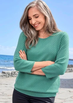 Pull en tricot avec motif à pois