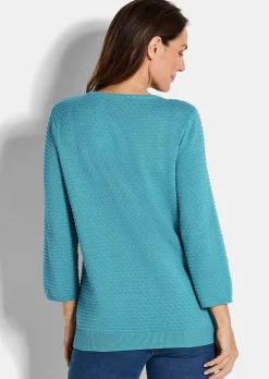 Pull en tricot avec motif à pois