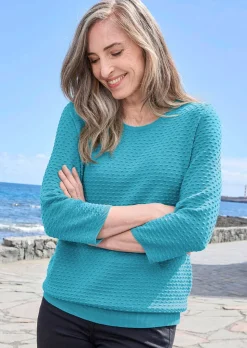Pull en tricot avec motif à pois