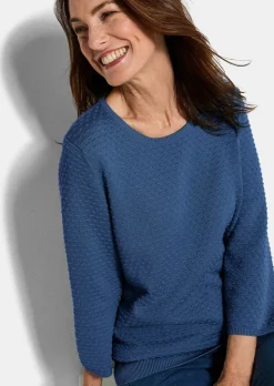 Pull en tricot avec motif à pois