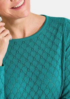 Pull en tricot à la structure alvéolée