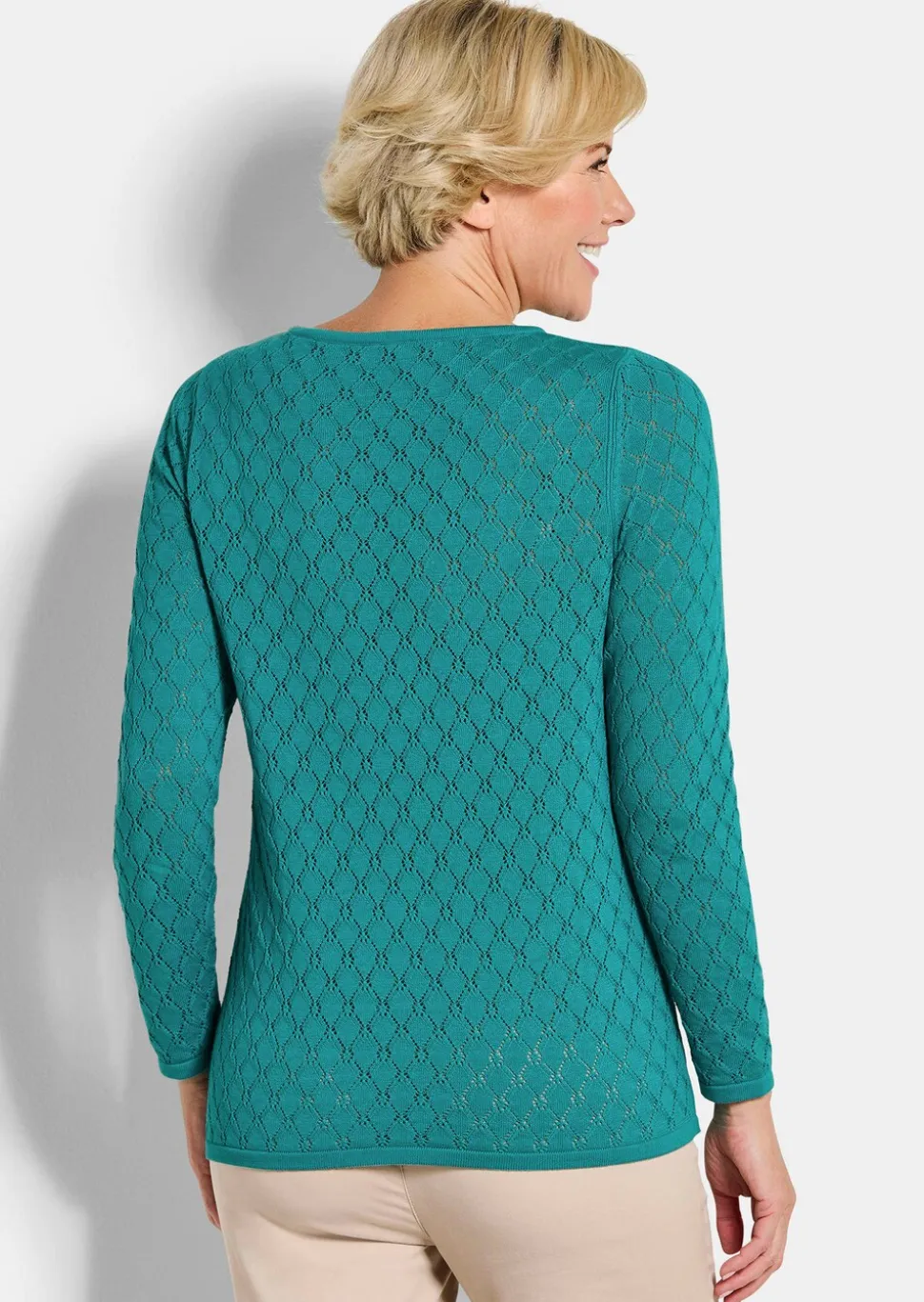 Pull en tricot à la structure alvéolée