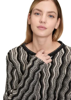 Pull en tricot à motif ondulé