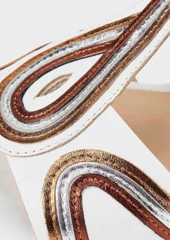 Sandales en cuir avec talon compensé