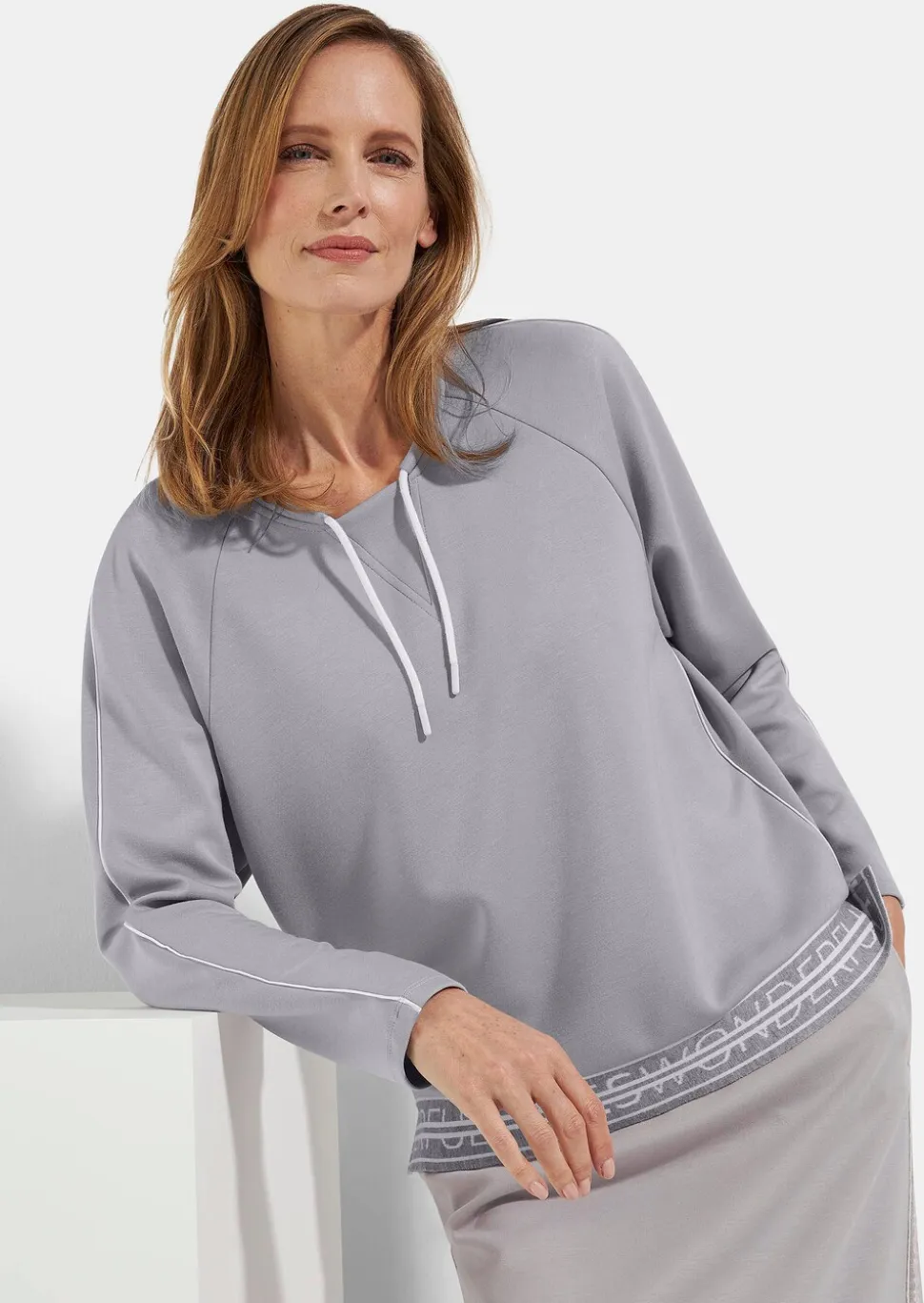 Sweat-shirt avec lien de serrage et passepoils