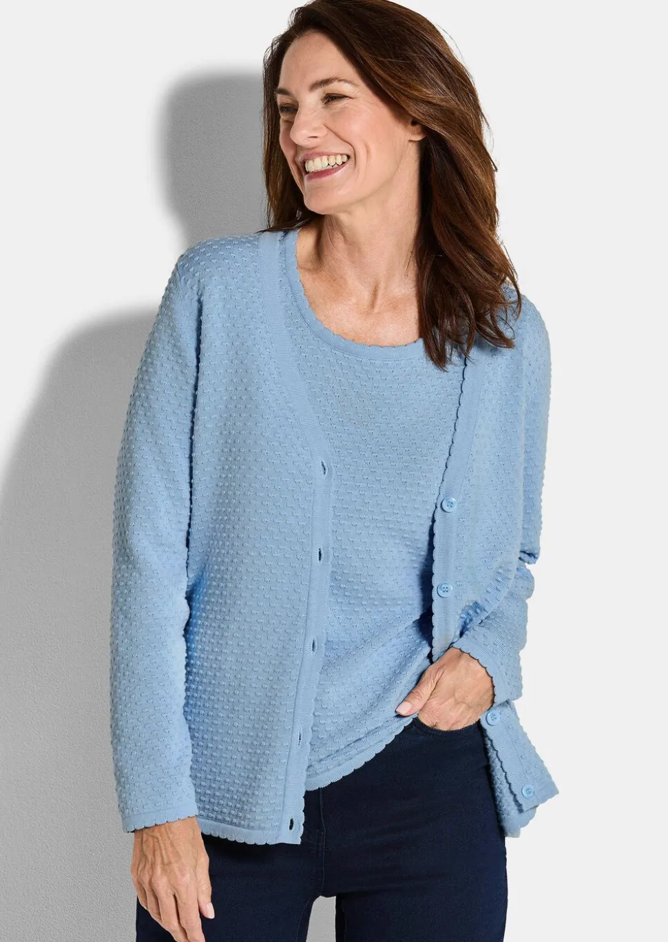 Veste en tricot avec motif à pois
