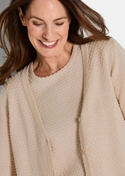 Veste en tricot avec motif à pois