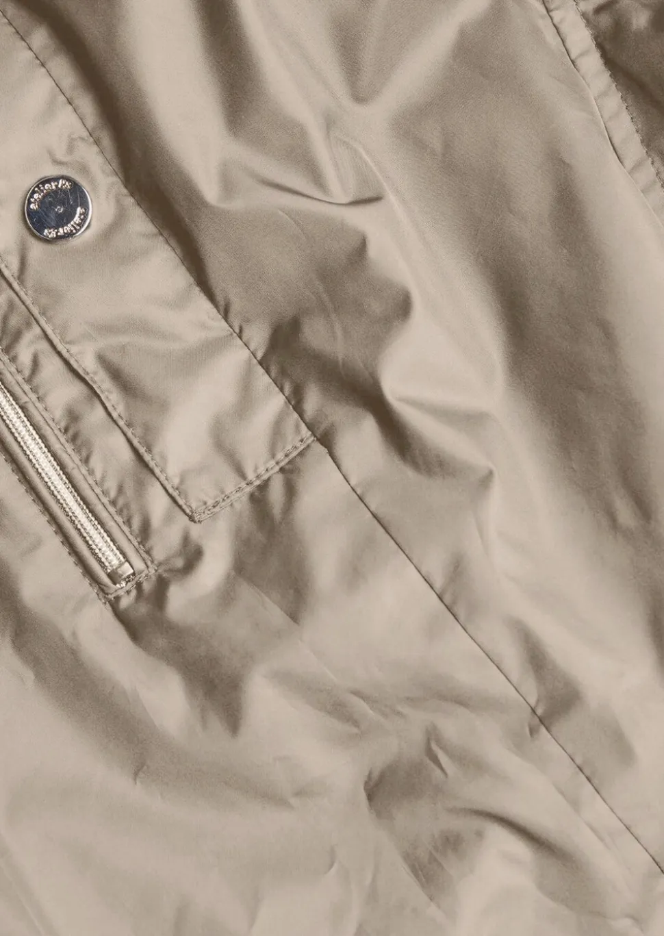 Veste longue ultra-légère avec capuche invisible