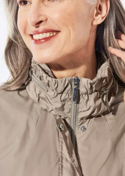 Veste longue ultra-légère avec capuche invisible