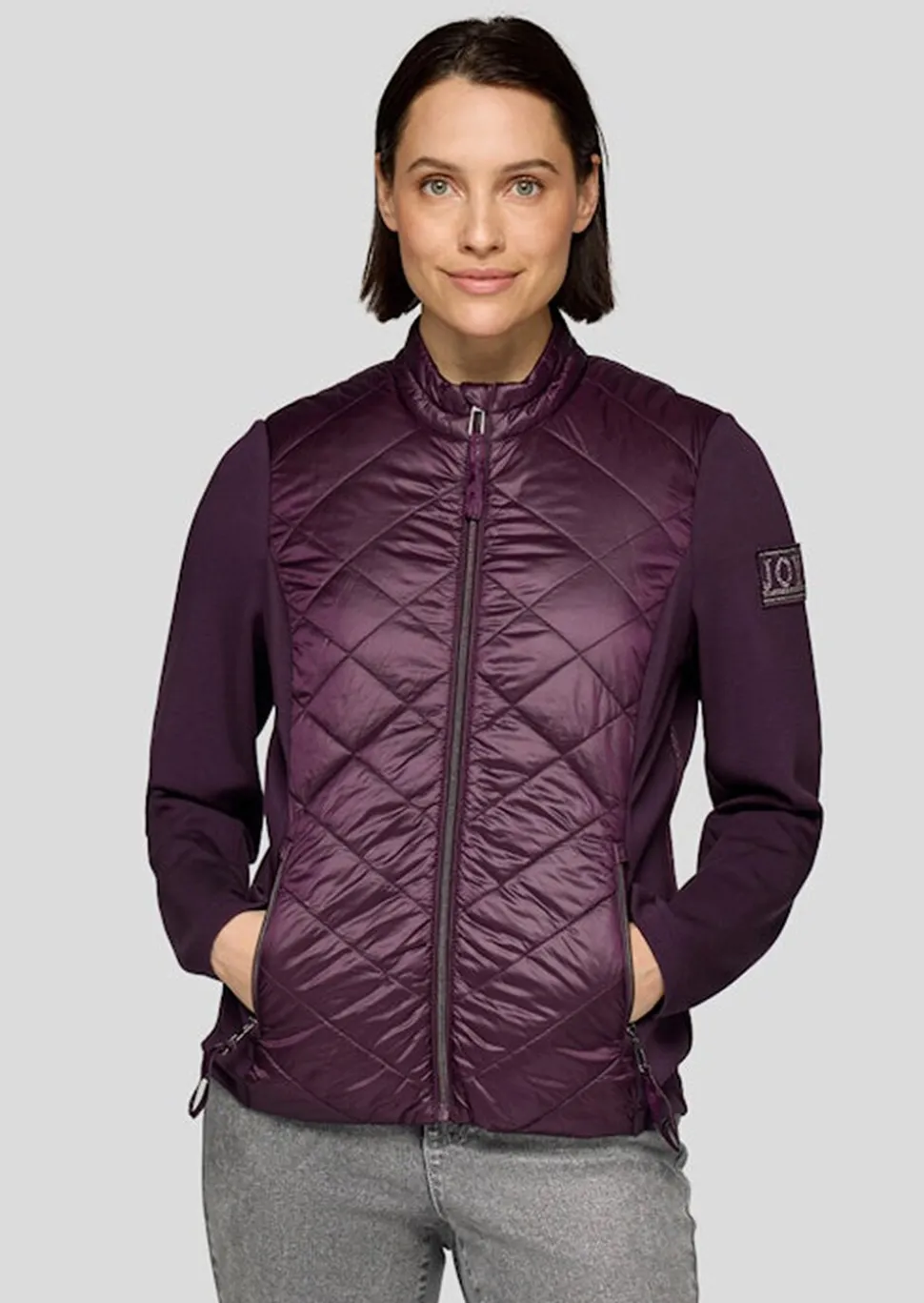 Veste matelassée avec empiècements en jersey
