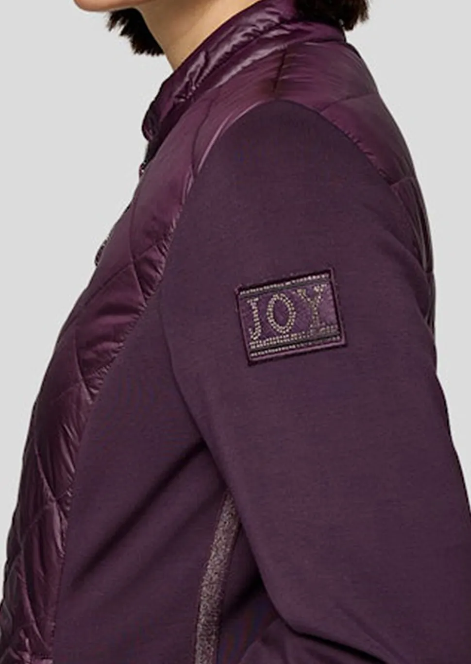 Veste matelassée avec empiècements en jersey